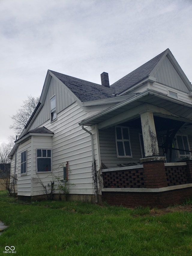 view of property exterior featuring a lawn