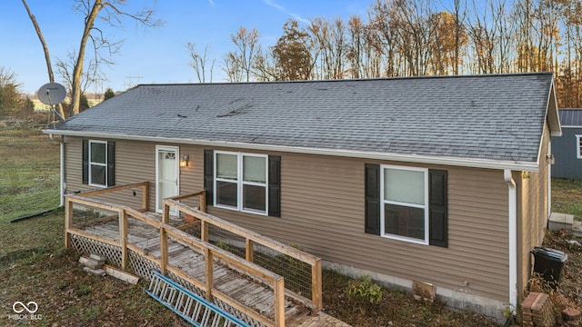 view of front of home featuring a wooden deck