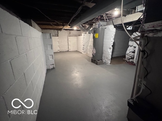 basement featuring water heater