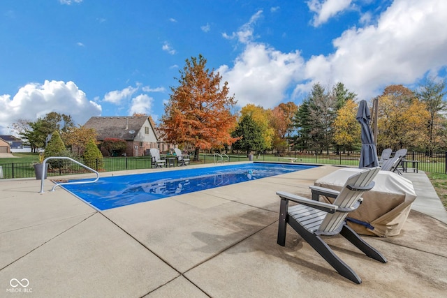 view of pool with a patio