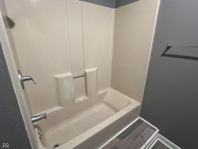 bathroom with shower / tub combination