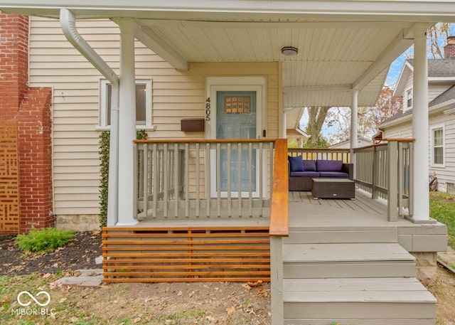 wooden terrace with a porch