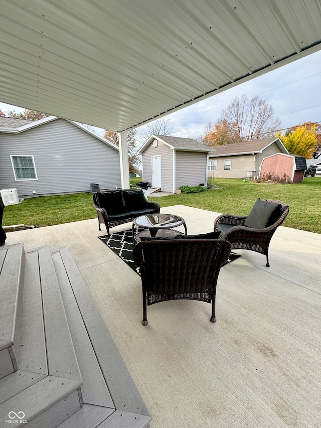 view of patio / terrace with a storage shed