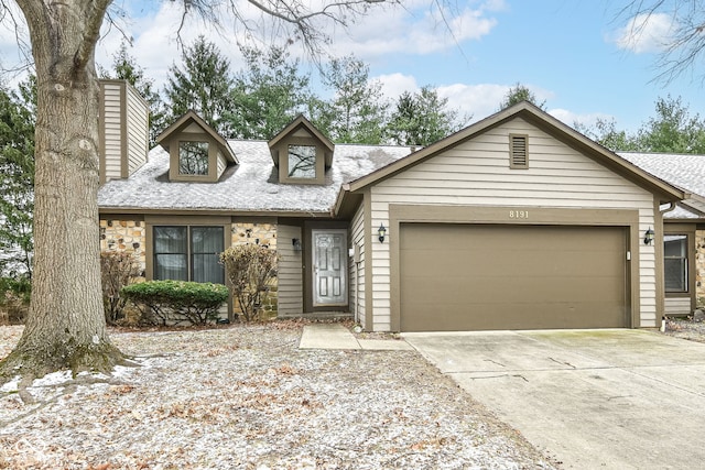 view of front of property featuring a garage