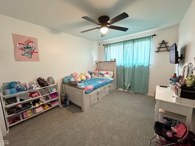 carpeted bedroom with ceiling fan