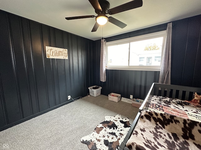 bedroom with ceiling fan and carpet floors