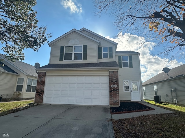 front of property with a garage