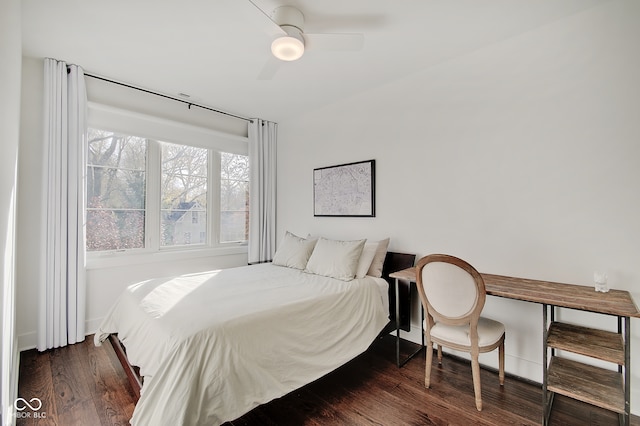 bedroom with dark wood-type flooring and ceiling fan