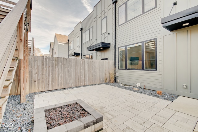 view of patio / terrace featuring a fire pit