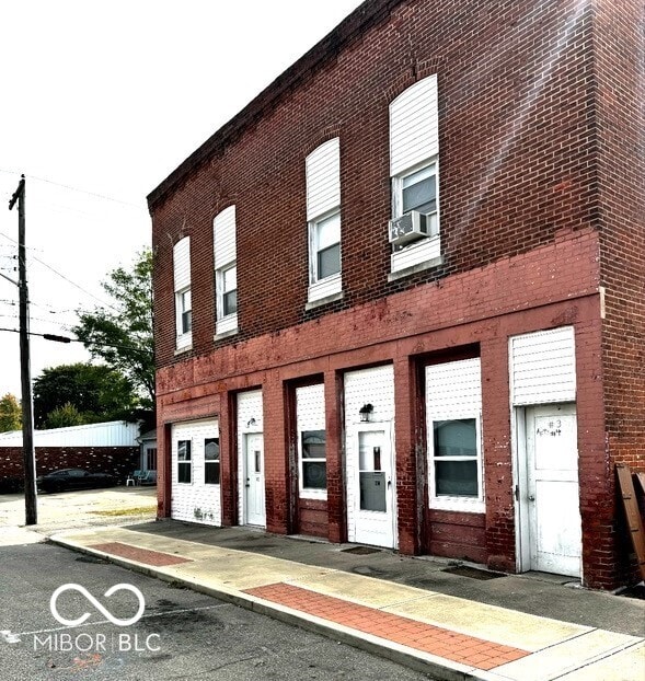 view of front of home featuring cooling unit