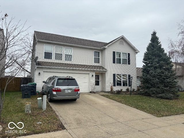 front of property with a front yard and a garage