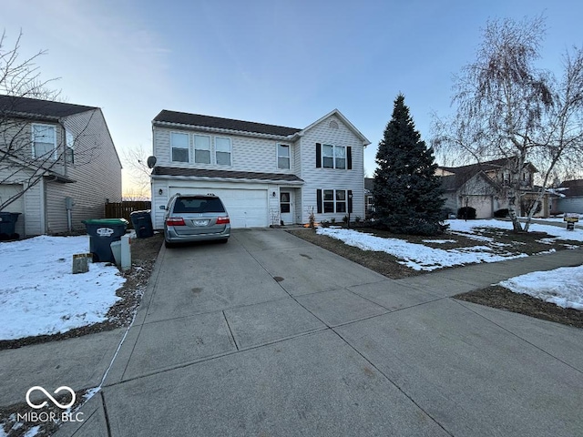 view of front property with a garage