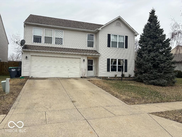 front of property with a garage