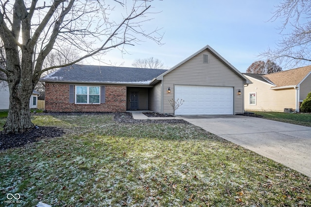 single story home featuring a front lawn and a garage