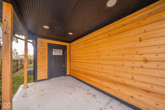425 Sanders St, Indianapolis, IN 46225 - doorway to property with fence and a patio area