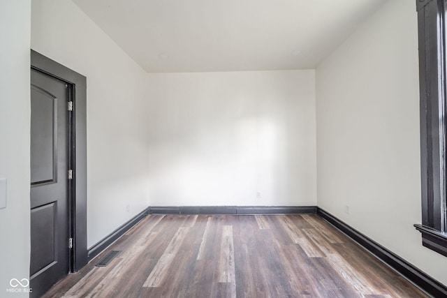 425 Sanders St, Indianapolis, IN 46225 - empty room with wood finished floors and baseboards