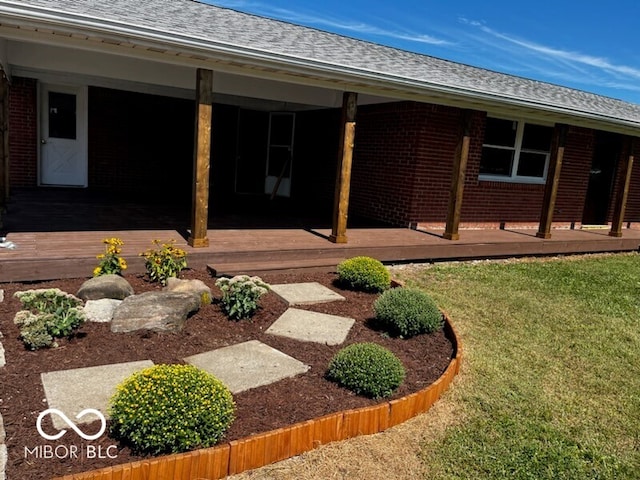 exterior space featuring a yard and a deck