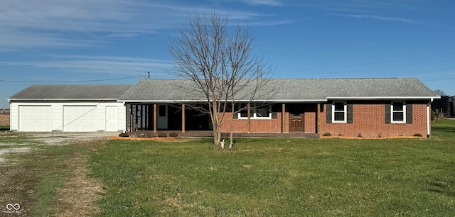 ranch-style home with a garage and a front yard