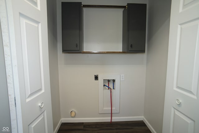 laundry room with cabinets, washer hookup, hookup for an electric dryer, and dark wood-type flooring