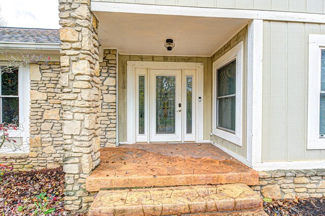 5909 Buttonwood Dr, Noblesville, IN 46062 - view of exterior entry featuring covered porch and stone siding