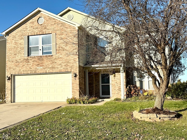 view of property with a garage and a front lawn