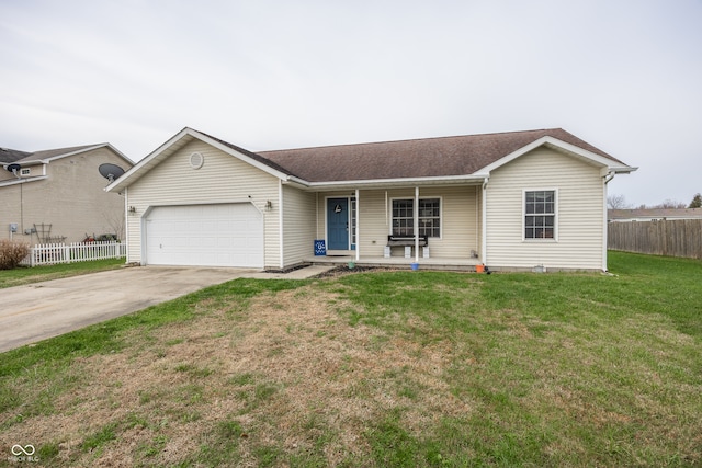 single story home with covered porch, a garage, and a front lawn