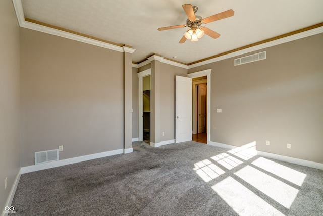 unfurnished bedroom featuring ceiling fan, carpet flooring, and crown molding