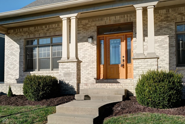 7290 Lockford Walk N, Avon, IN 46123 - property entrance with covered porch and brick siding