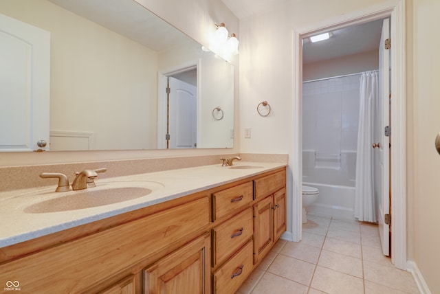 full bathroom featuring toilet, vanity, tile patterned flooring, and shower / bath combo with shower curtain