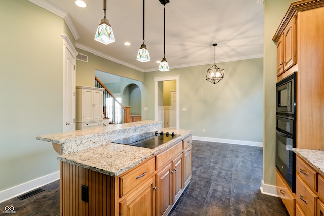 kitchen featuring a center island, black appliances, ornamental molding, light stone countertops, and pendant lighting