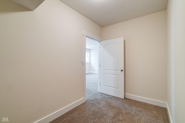 7290 Lockford Walk N, Avon, IN 46123 - spare room featuring light colored carpet and baseboards