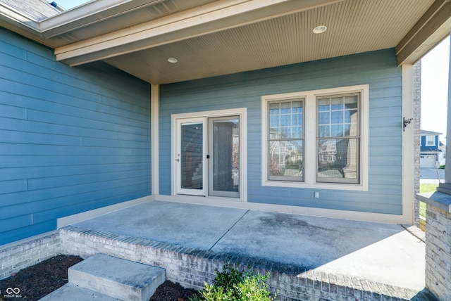 7290 Lockford Walk N, Avon, IN 46123 - view of exterior entry with a patio