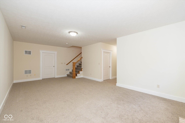 7290 Lockford Walk N, Avon, IN 46123 - spare room with stairway and light carpet