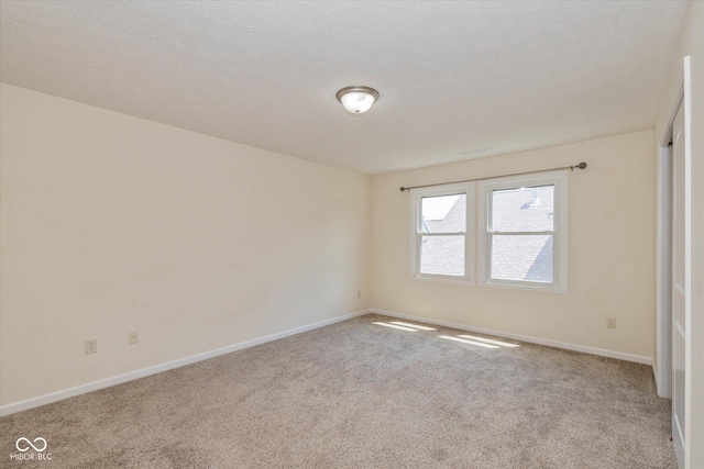 7290 Lockford Walk N, Avon, IN 46123 - empty room featuring carpet floors and baseboards