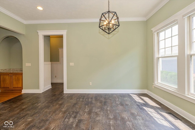 7290 Lockford Walk N, Avon, IN 46123 - empty room with healthy amount of natural light, a chandelier, ornamental molding, dark wood-type flooring, and recessed lighting