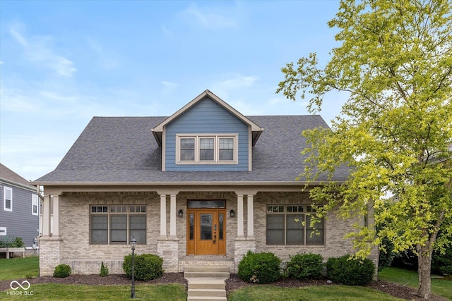 7290 Lockford Walk N, Avon, IN 46123 - craftsman house with brick siding, a shingled roof, and a front lawn