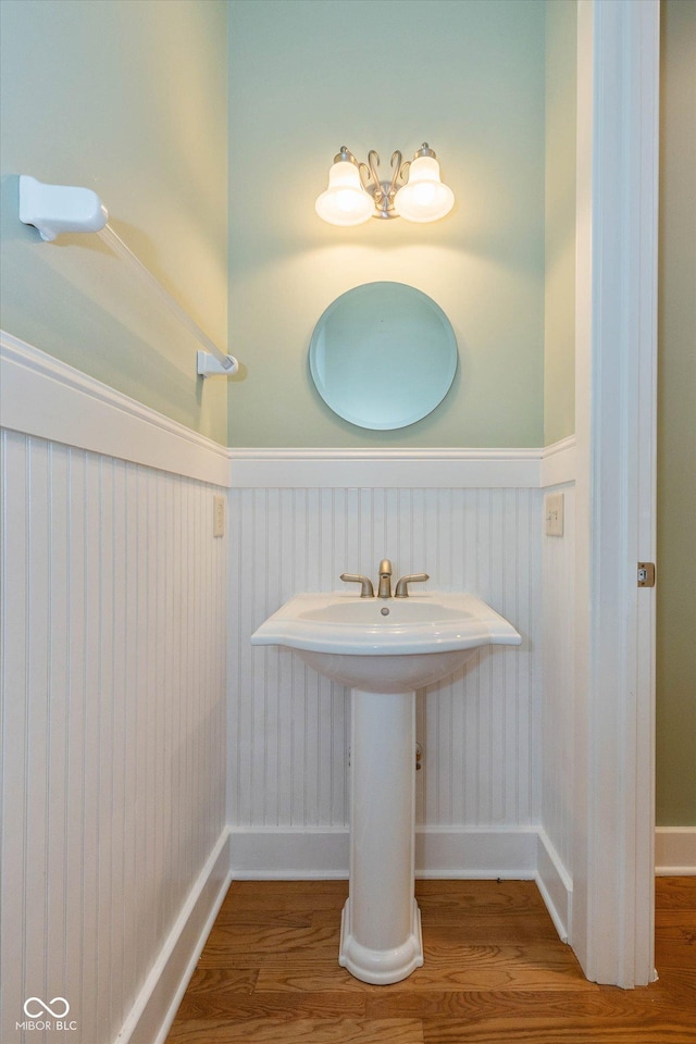 7290 Lockford Walk N, Avon, IN 46123 - bathroom featuring wainscoting and wood finished floors