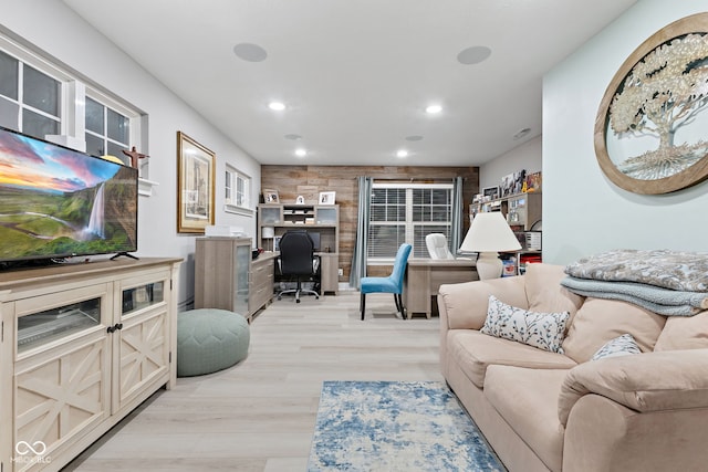 living room with light hardwood / wood-style flooring