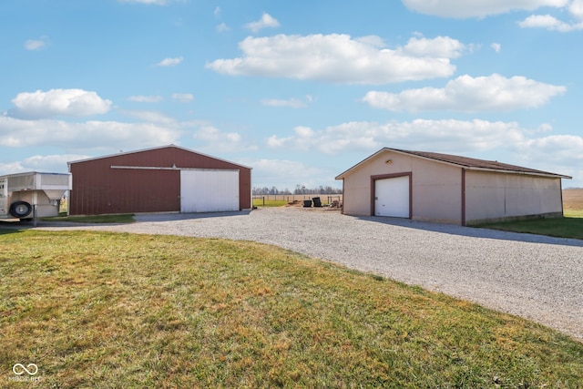 garage with a lawn