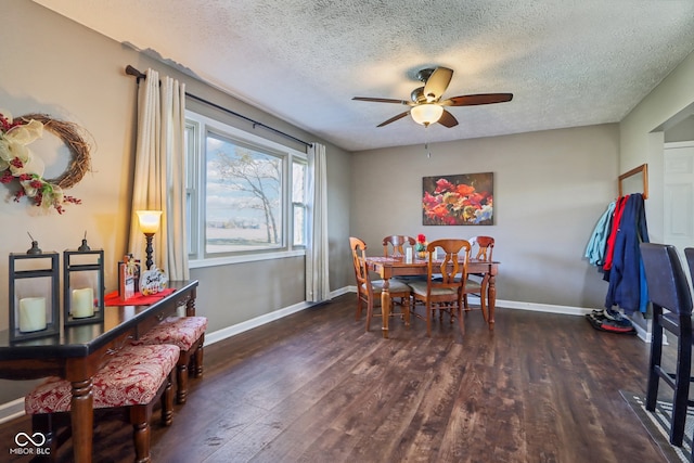 dining space with ceiling fan, a textured ceiling, and dark hardwood / wood-style flooring