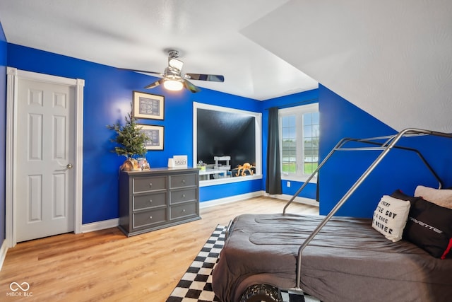 bedroom featuring ceiling fan and hardwood / wood-style floors