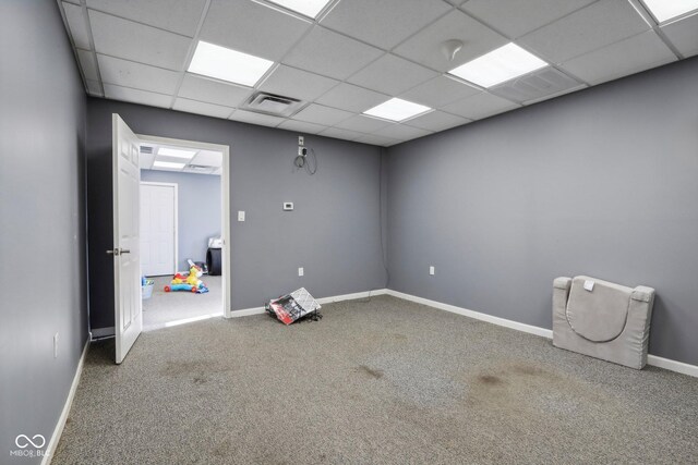 5784 N 600 E, Greenfield, IN 46140 - carpeted empty room with baseboards and a paneled ceiling