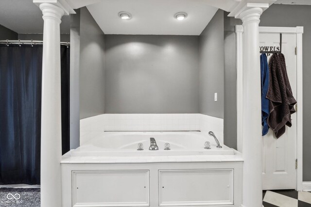 5784 N 600 E, Greenfield, IN 46140 - full bathroom featuring ornate columns, a bath, and a shower with curtain
