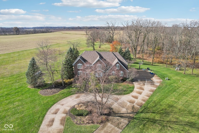 birds eye view of property featuring a rural view