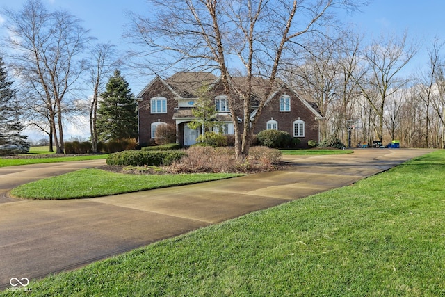 view of front of property with a front lawn