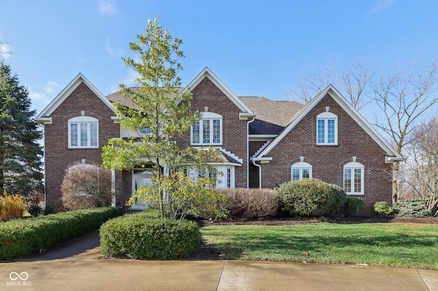 view of property with a front lawn