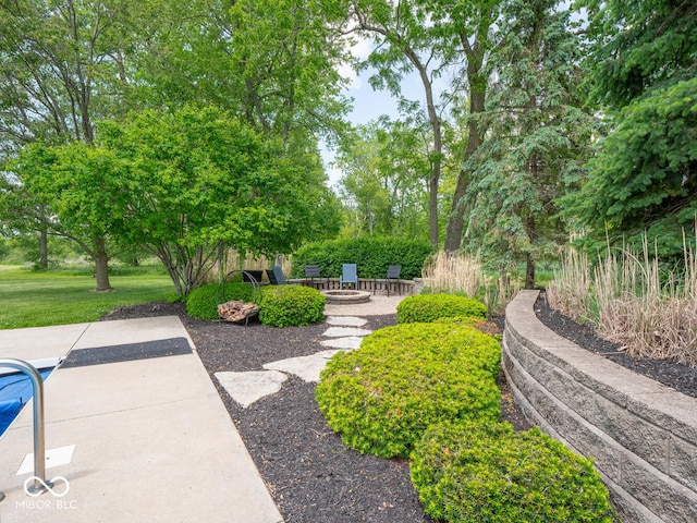 5784 N 600 E, Greenfield, IN 46140 - view of yard featuring an outdoor fire pit, a patio, and a pool