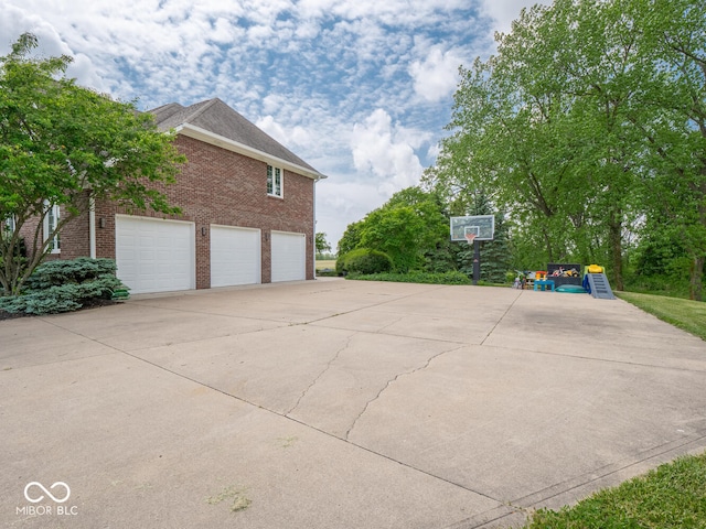 5784 N 600 E, Greenfield, IN 46140 - view of property exterior with brick siding and driveway