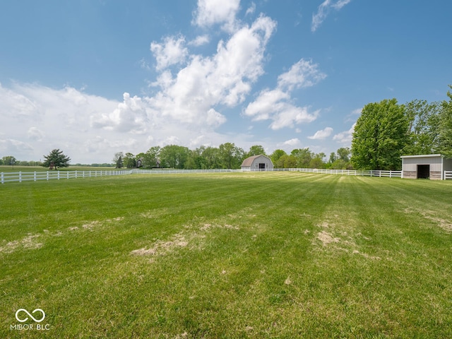 5784 N 600 E, Greenfield, IN 46140 - view of yard featuring a rural view, an outbuilding, and a barn