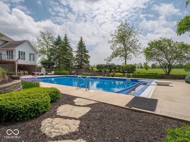5784 N 600 E, Greenfield, IN 46140 - view of swimming pool with a patio area and a diving board